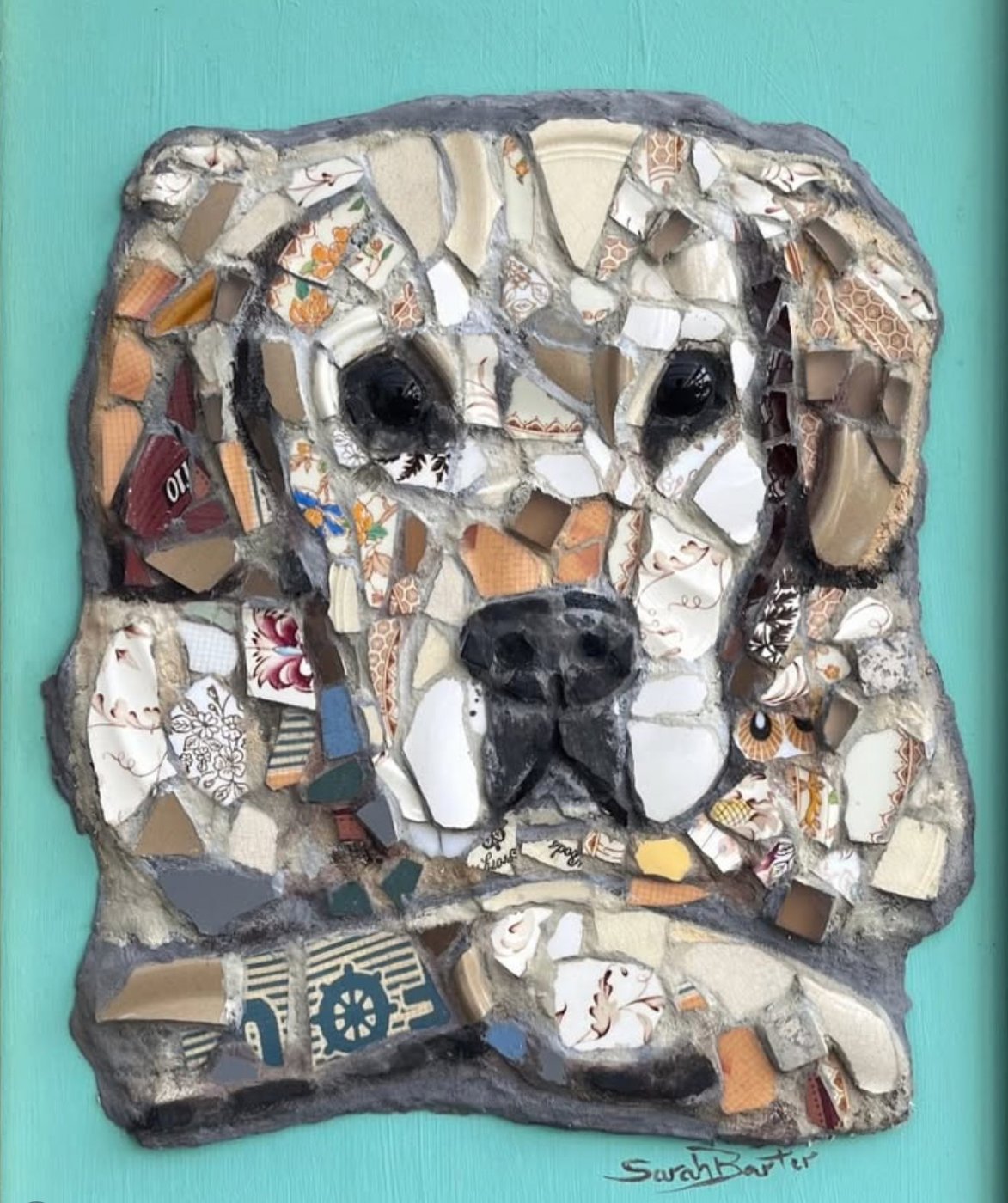 Mosaic portrait of a beagle made from broken vintage china