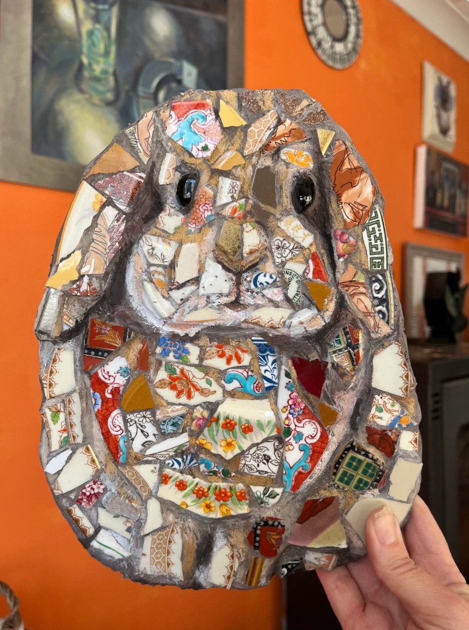 Mosaic rabbit portrait made from broken patterned china