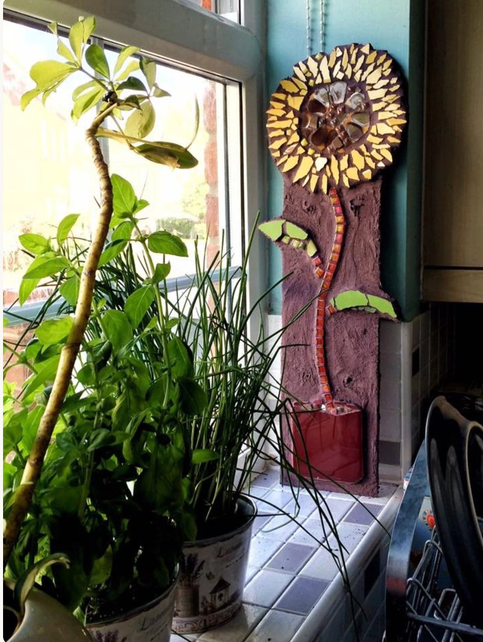 Tall mosaic sunflower with mirrored petals